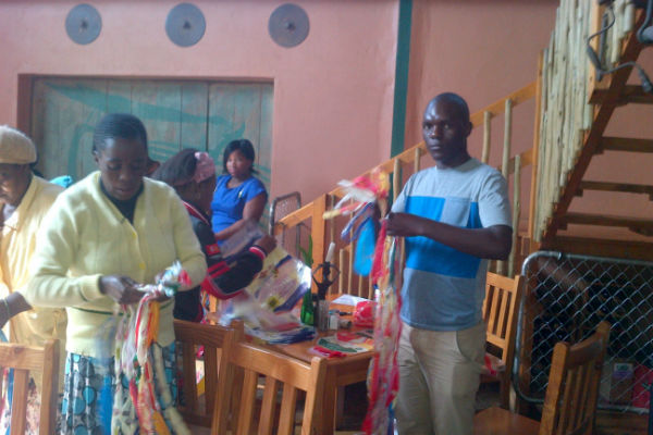 The Teachers learning to make skipping ropes from Plastic Bags