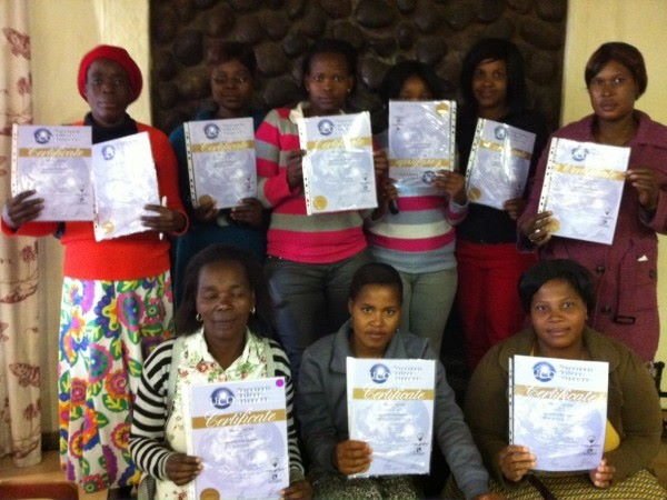 Educators with their Certificates